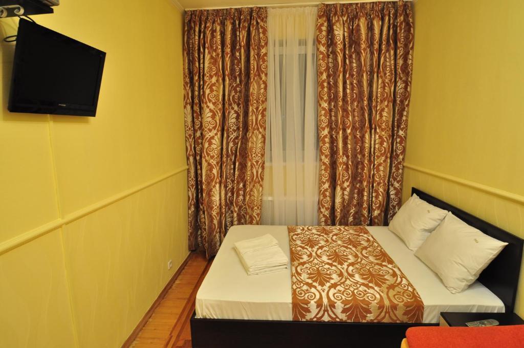 Status Guesthouse Киев Номер фото