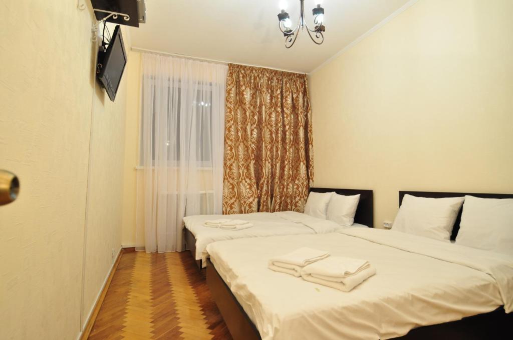 Status Guesthouse Киев Номер фото