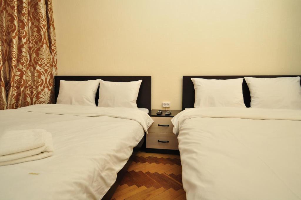 Status Guesthouse Киев Номер фото